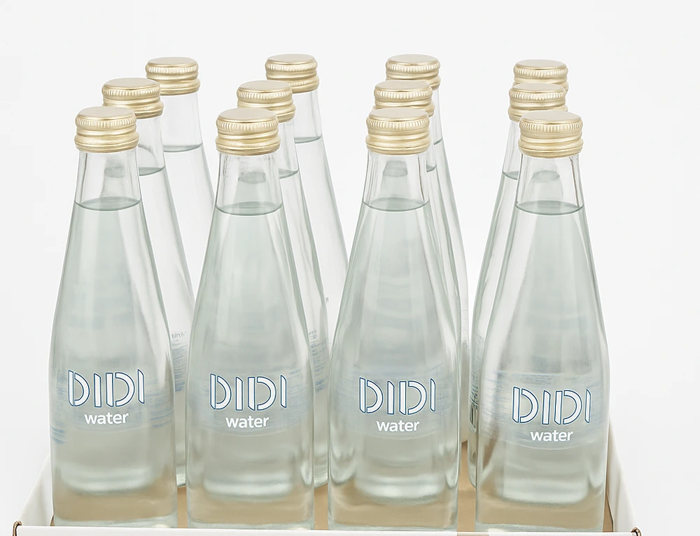 آب معدنی 300 سی سی دی دی آب معدنی 300 میلی لیتری شیشه ای دی دی - باکس 12 عددی دی دی